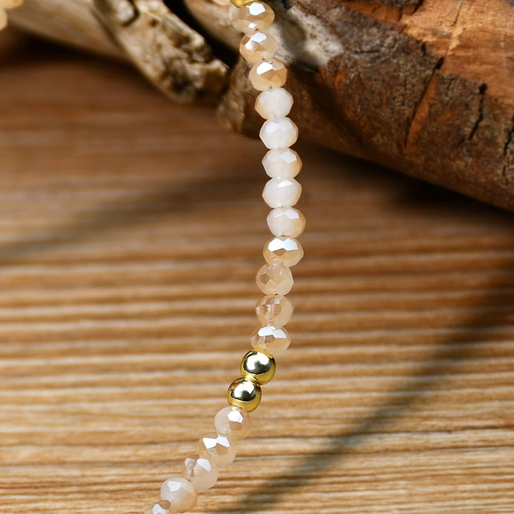 Side angle showing the necklace's delicate chain