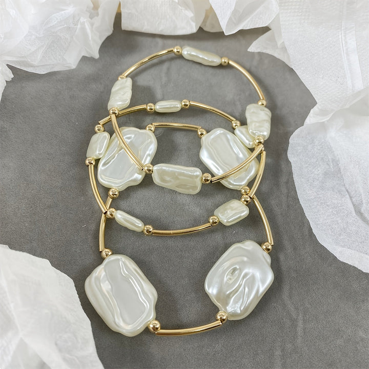 Baroque pearl bracelet set of three on a white background