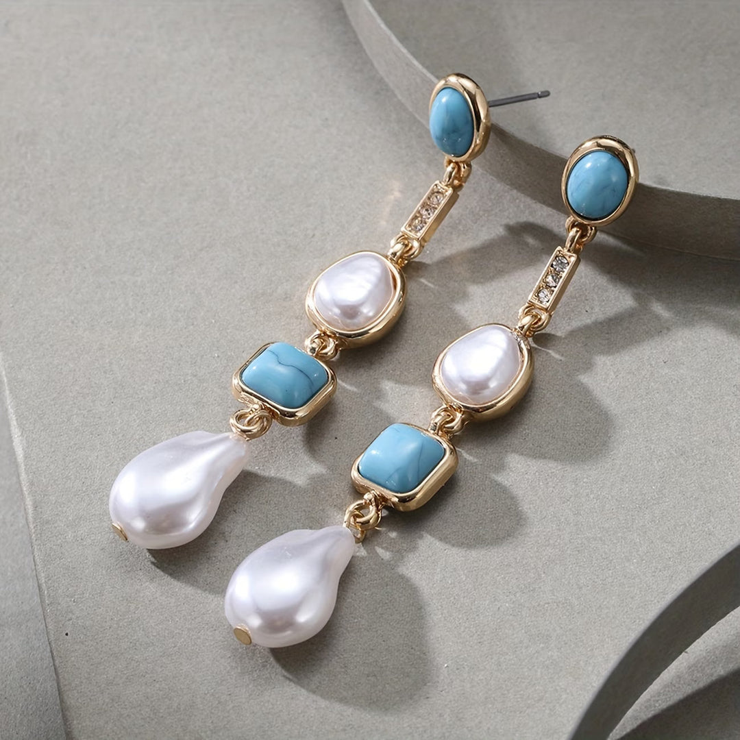 Main shot of the statement turquoise pearl earrings