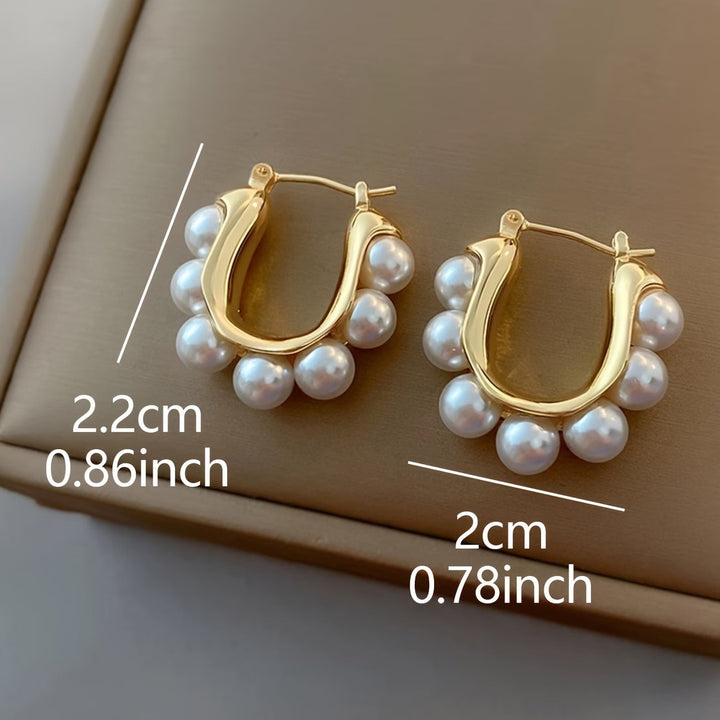 Pair of hoop earrings displayed together for comparison