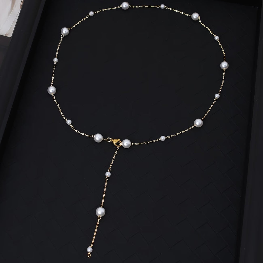 Close-up of the sky-blue accent bead among the pearl strand