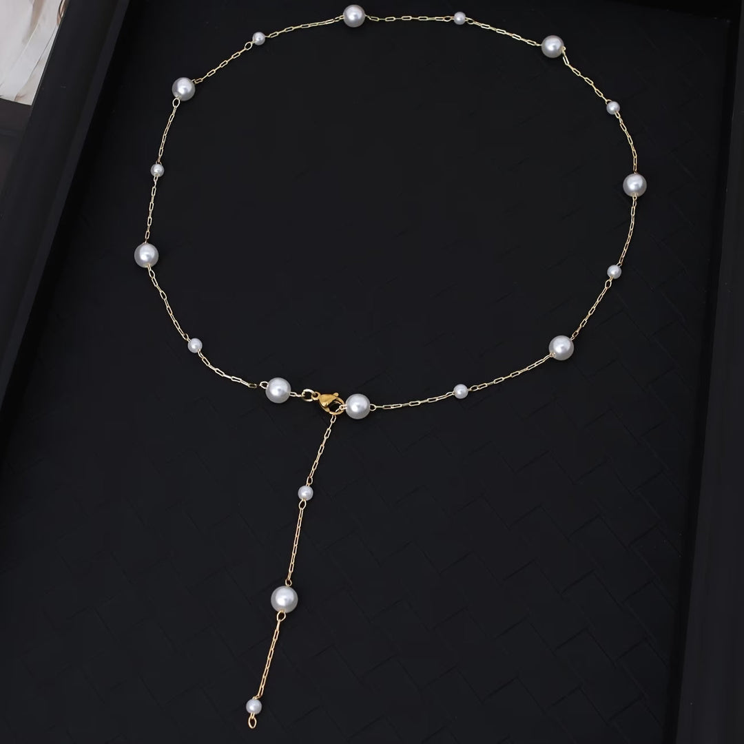 Close-up of the sky-blue accent bead among the pearl strand