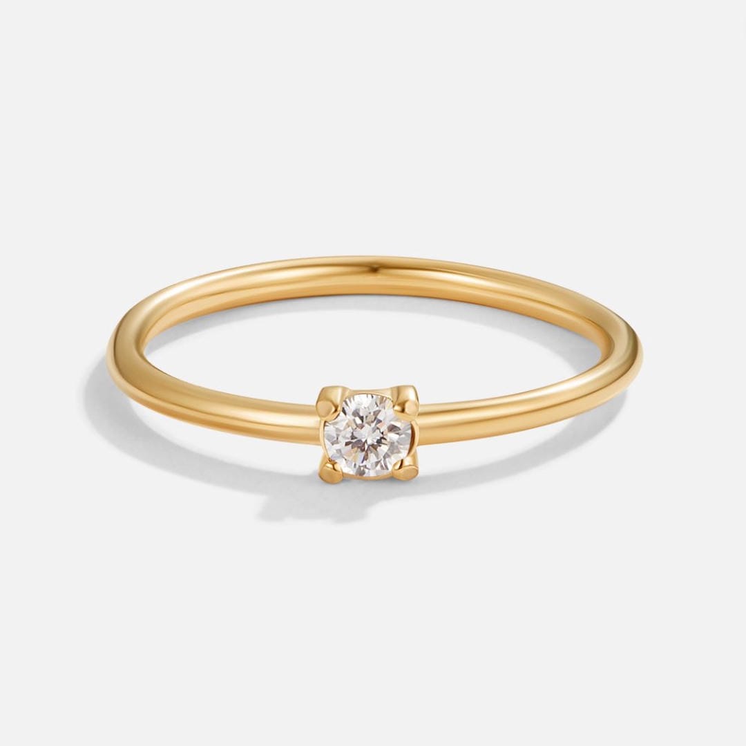 Ring worn on a model's hand