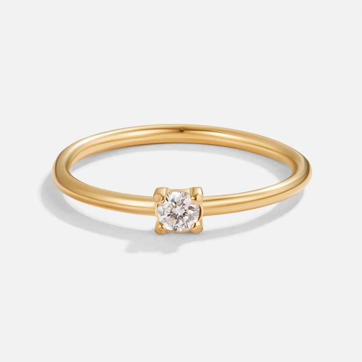 Ring worn on a model's hand