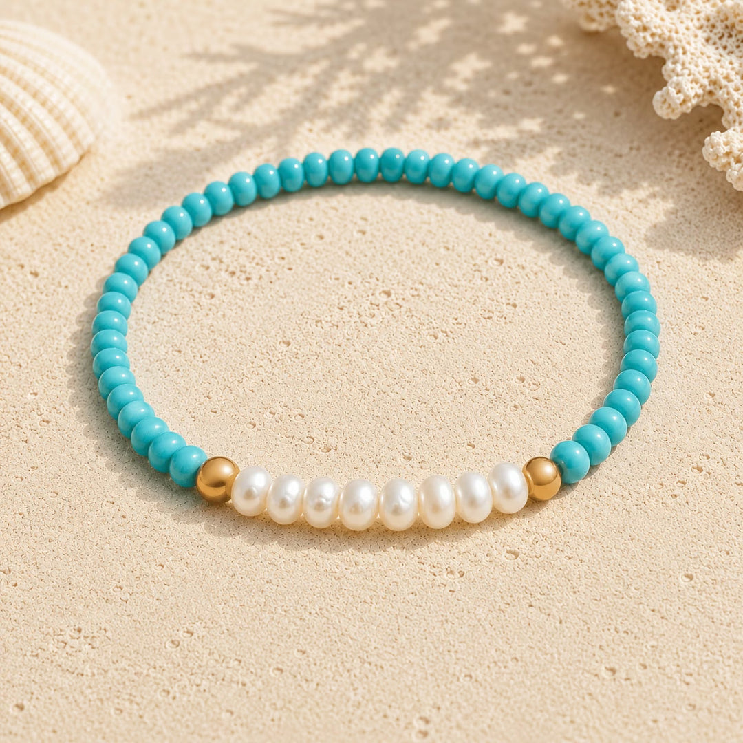 Main shot of the subtle pearl and turquoise bead bracelet