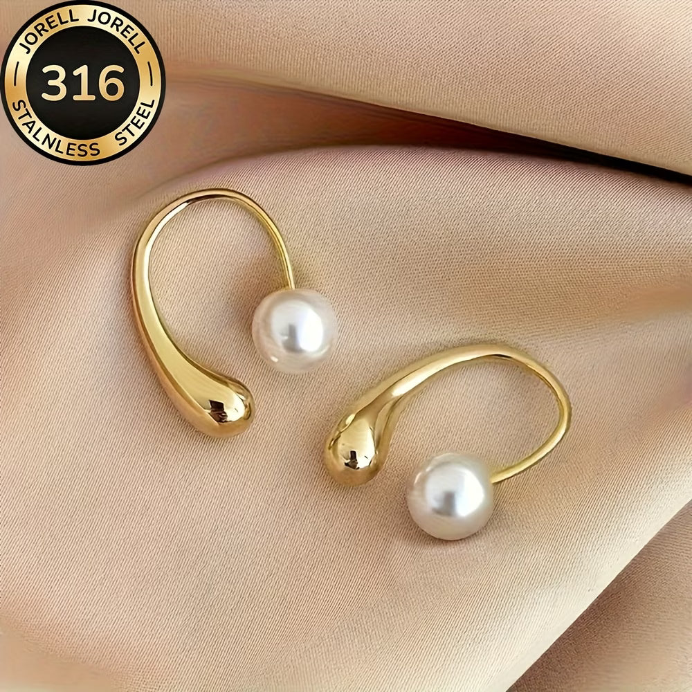 Model wearing the minimalist arc pearl earrings