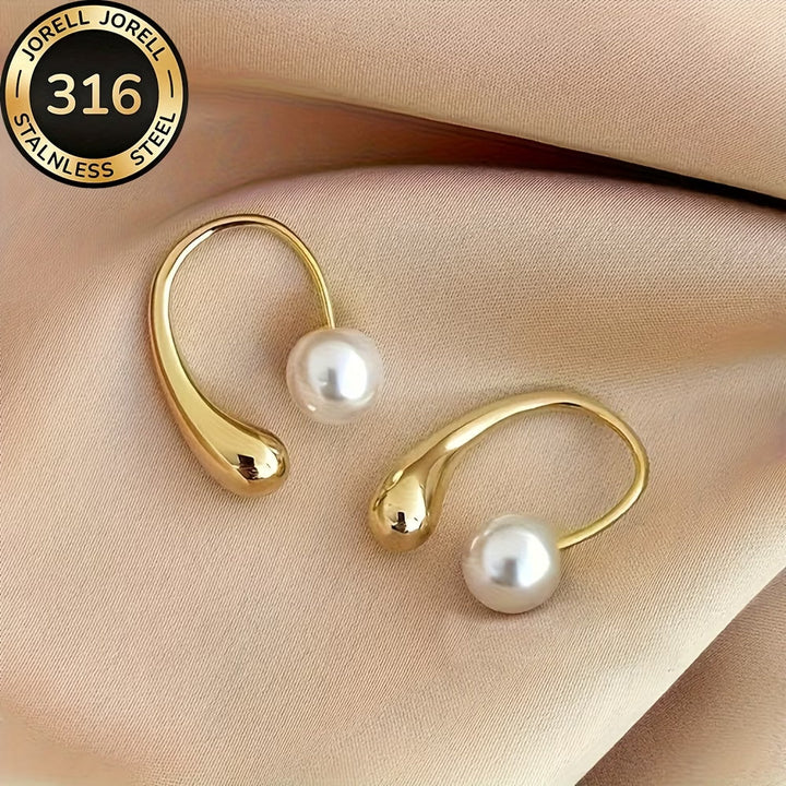Model wearing the minimalist arc pearl earrings