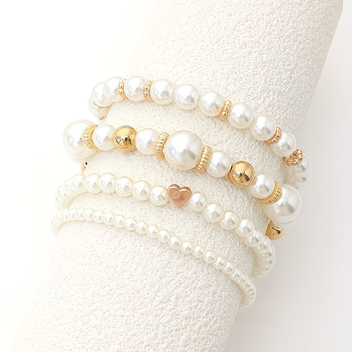 All eight bracelets laid out together