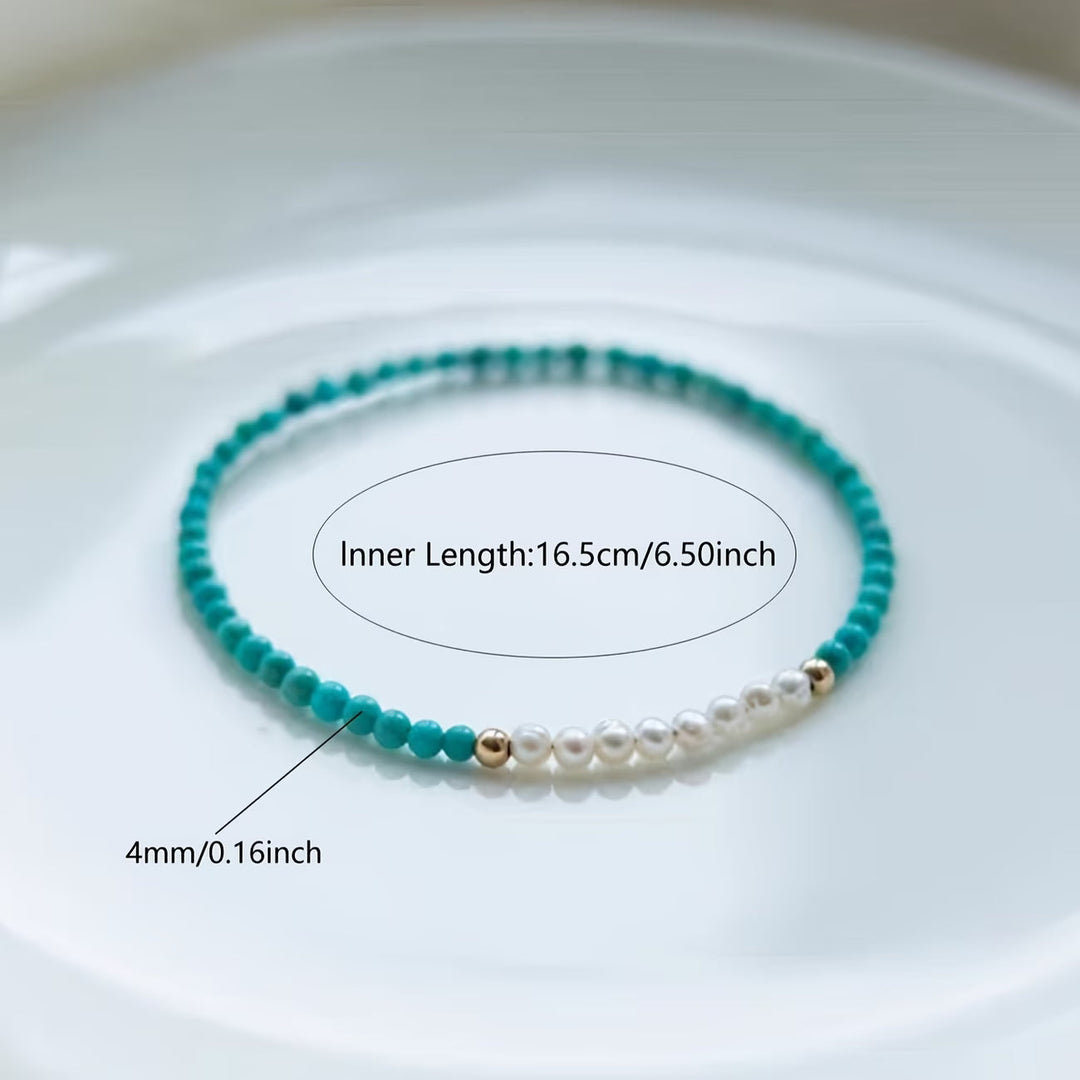 Top-down view of the bracelet coiled on a flat surface