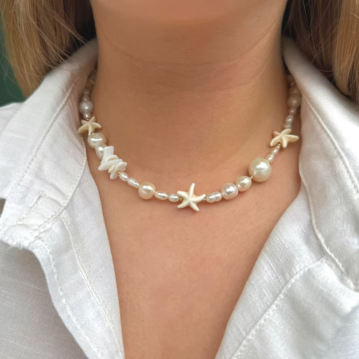 Main shot of the coastal pearl layered necklace