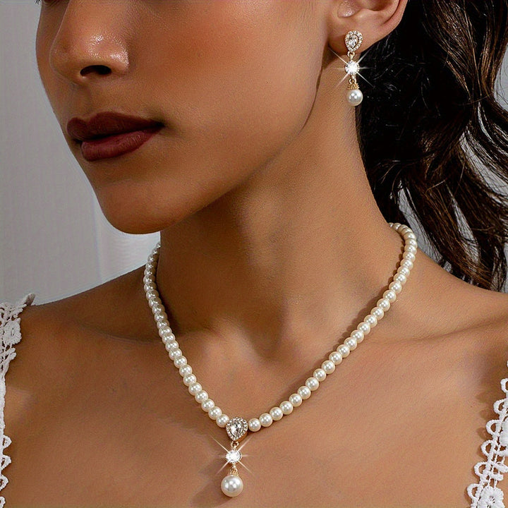 Angled shot of the necklace clasp and pearl strand