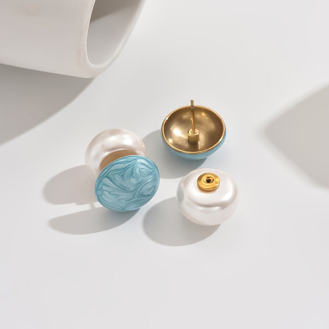 Earrings worn on a model's ear