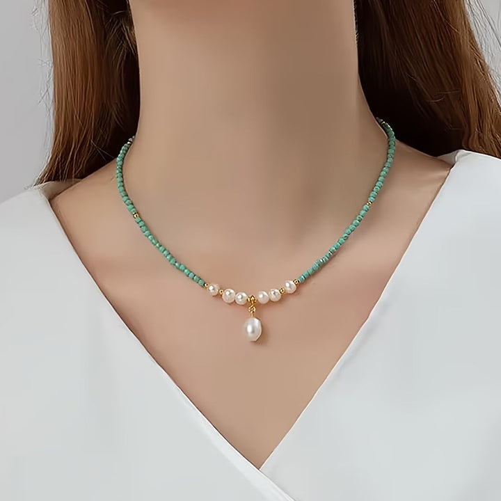 Angled shot showing the pearl and turquoise bead spacing