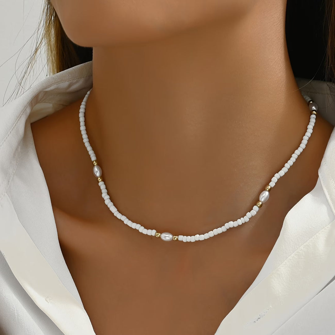 Close-up of the small round pearls strung together