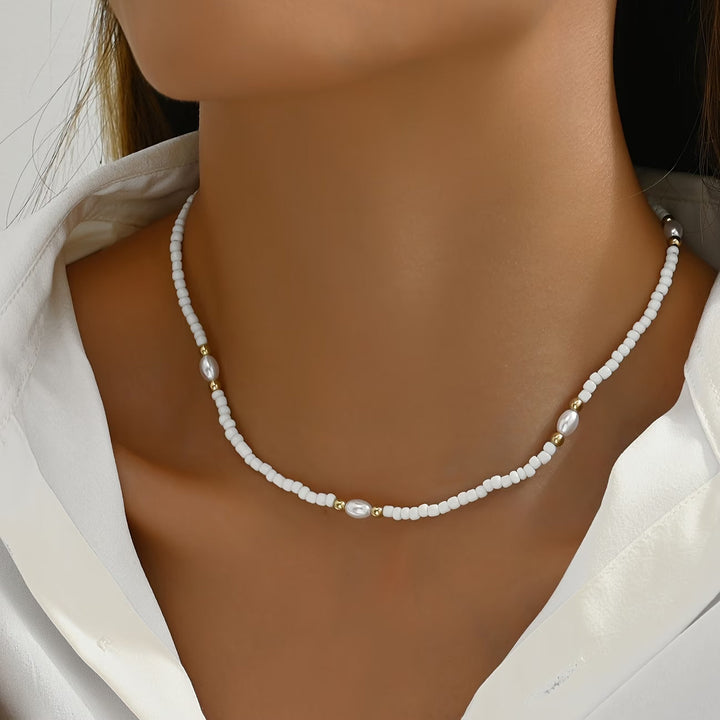 Close-up of the small round pearls strung together