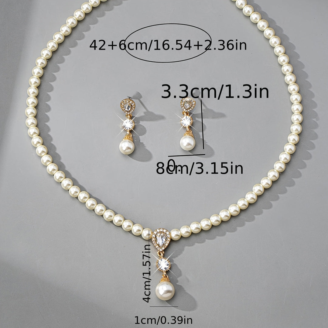 Full jewellery set styled together on a soft fabric backdrop