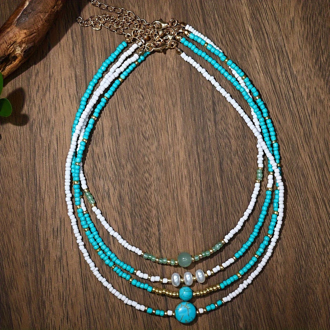 Stack of beaded bracelets worn together on a wrist