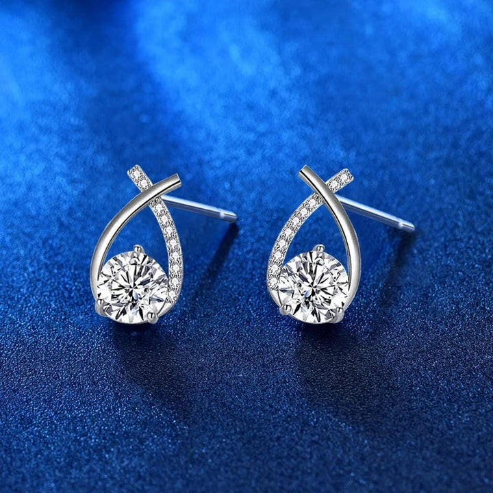 Both earrings displayed together on a jewellery tray