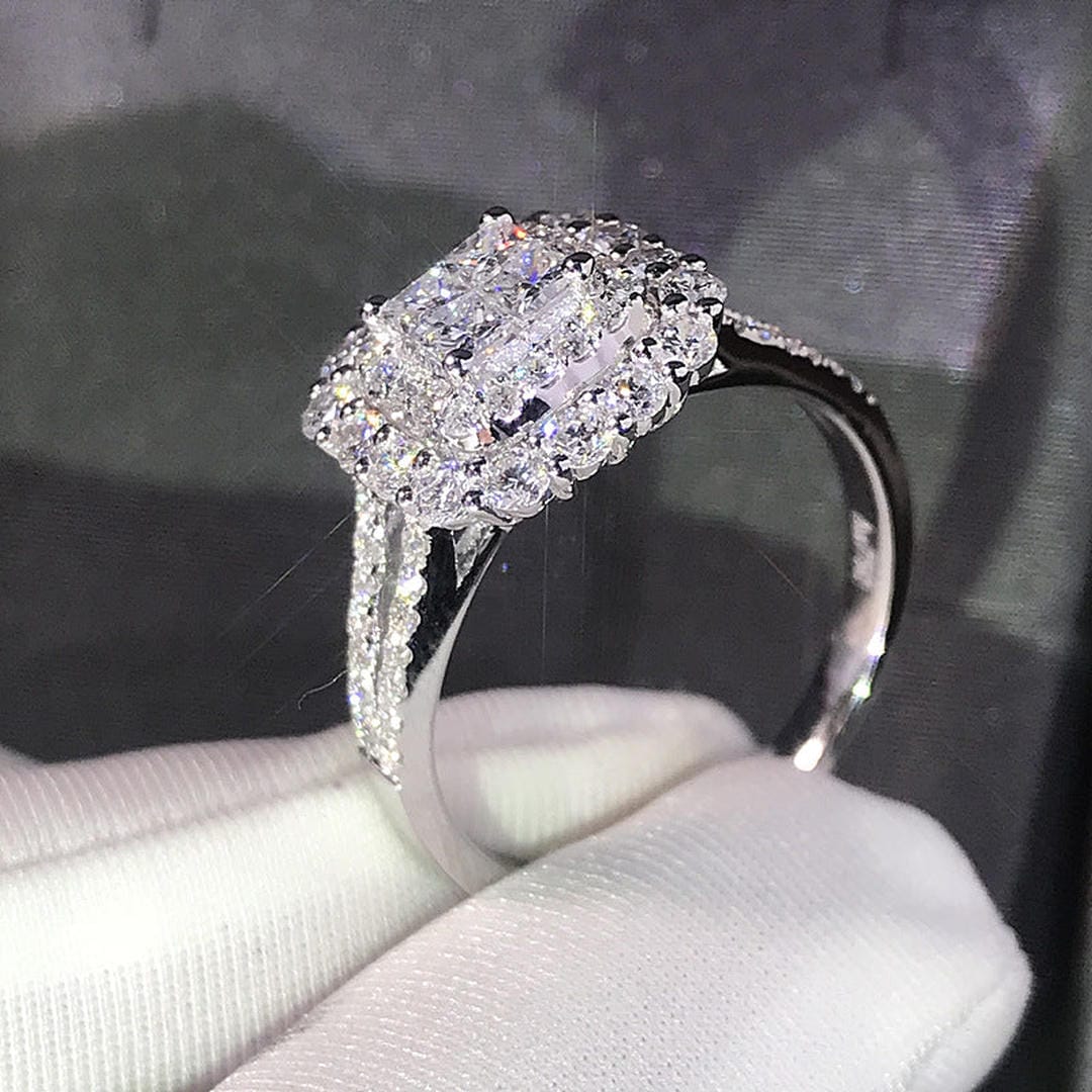 Ring worn on a model's hand