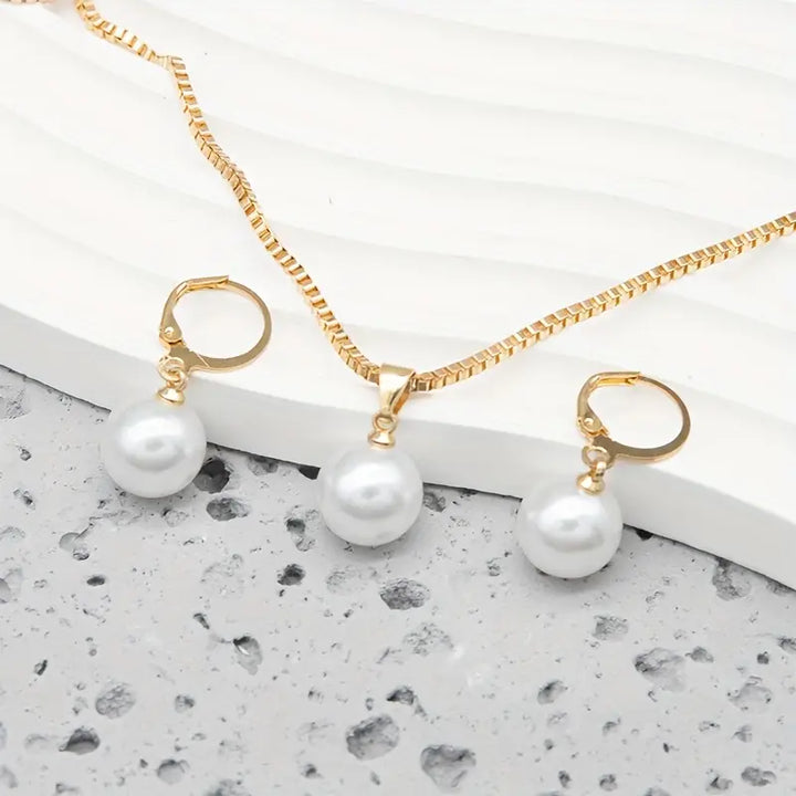 Model wearing the layered pearl necklace set