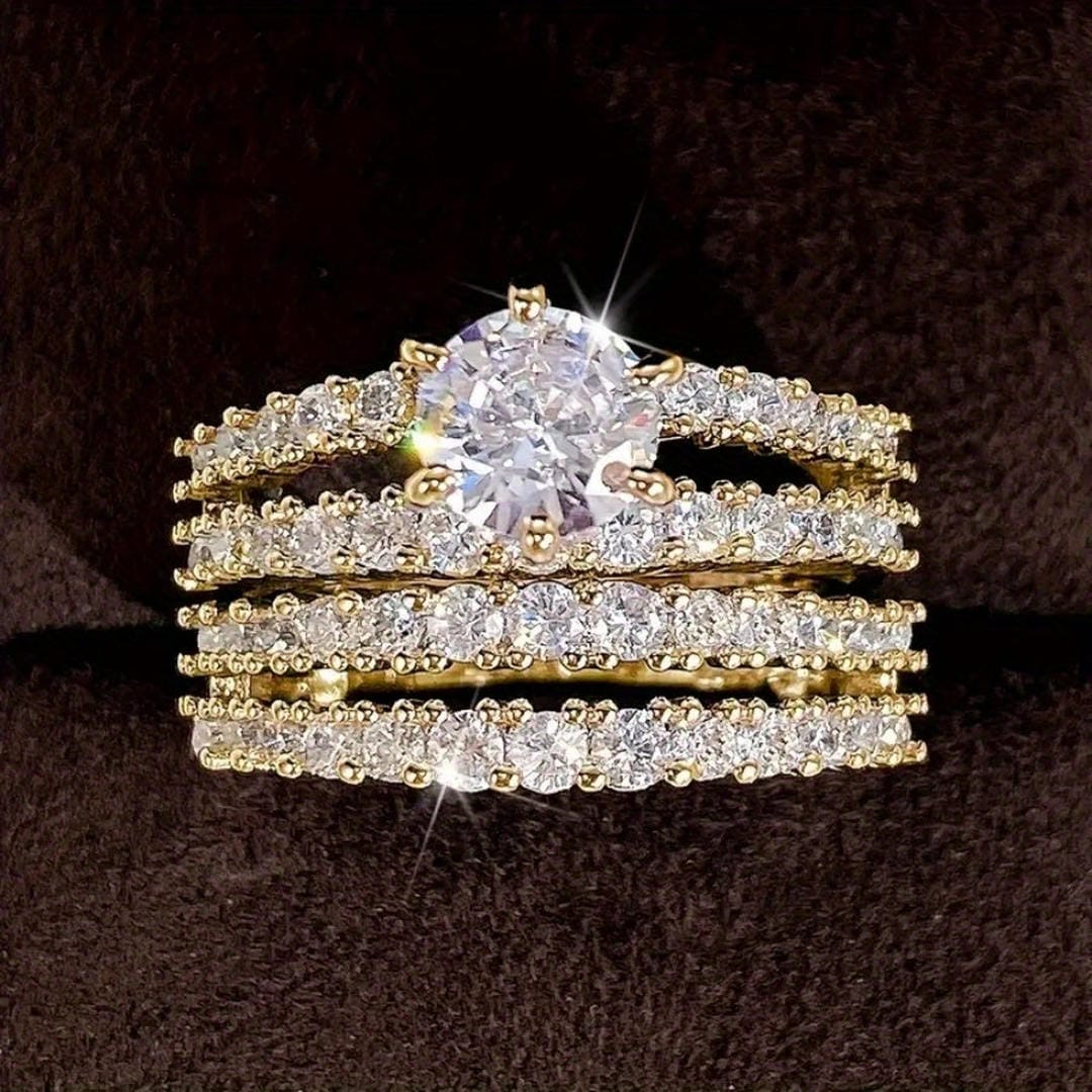 Both rings displayed together on a jewellery tray