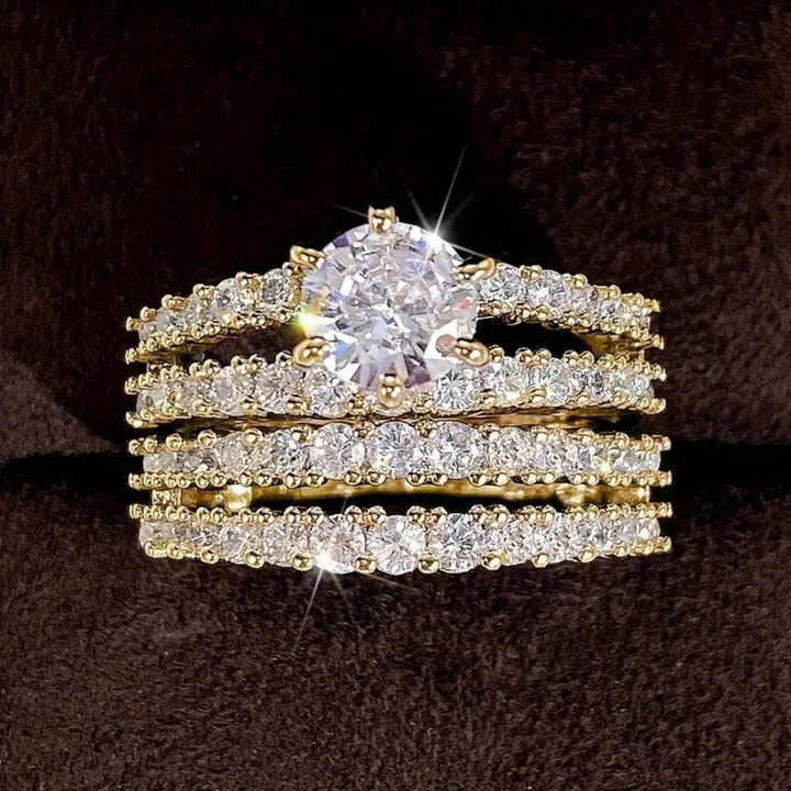 Both rings displayed together on a jewellery tray