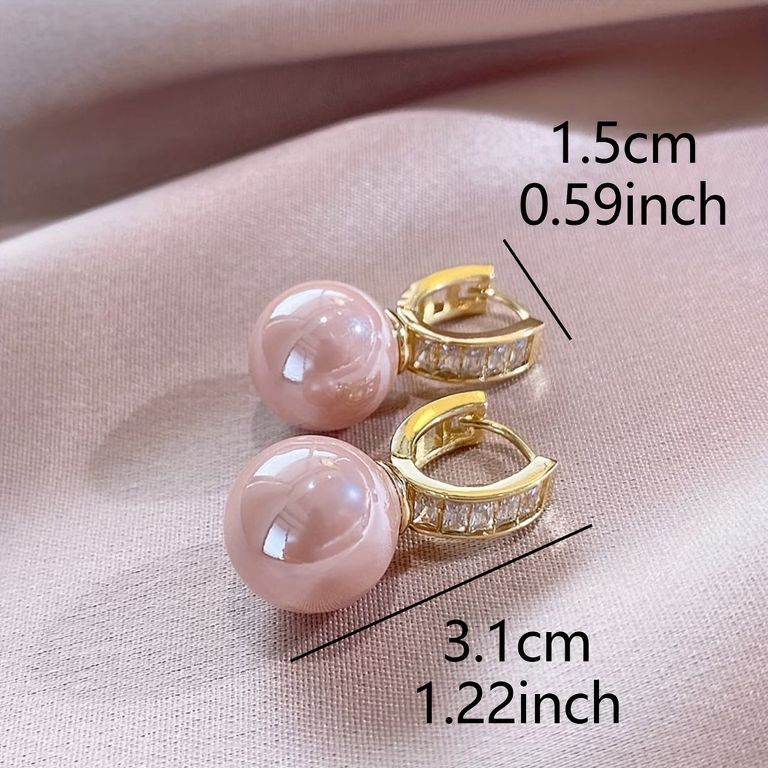 Model wearing the rose pearl earrings