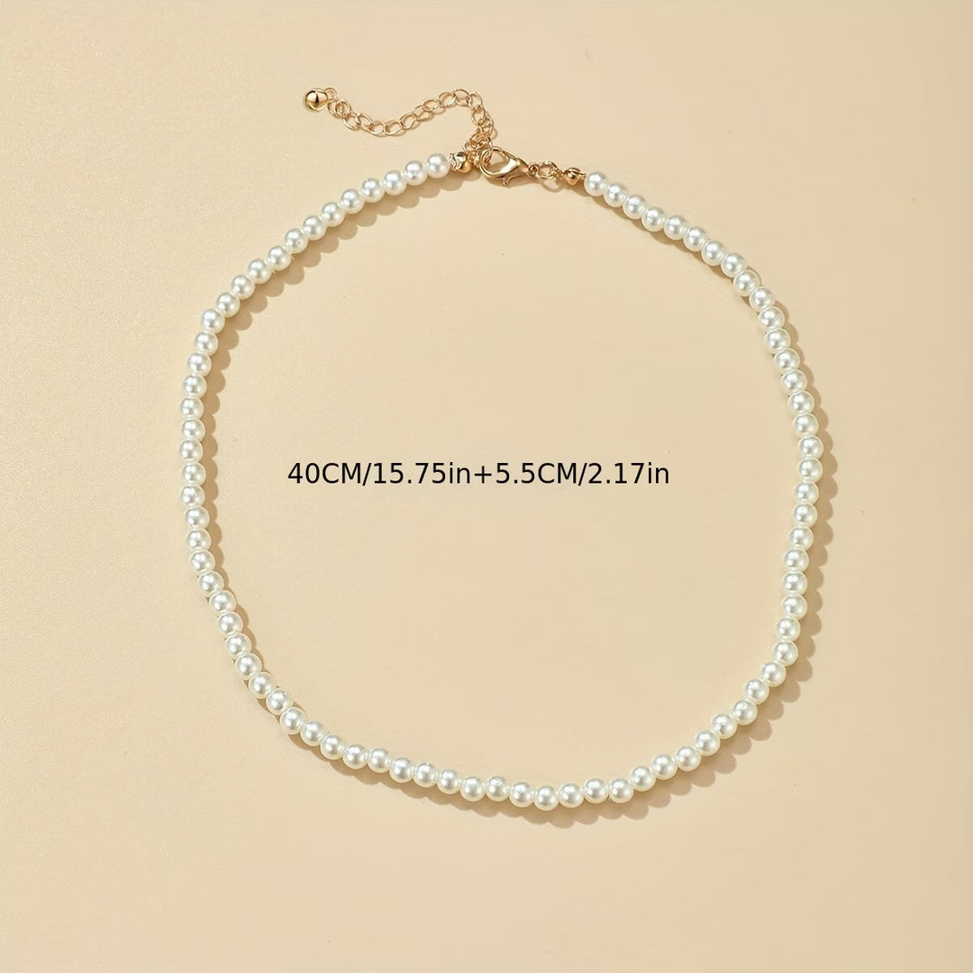 Classic pearl necklace styled around a mannequin neck form