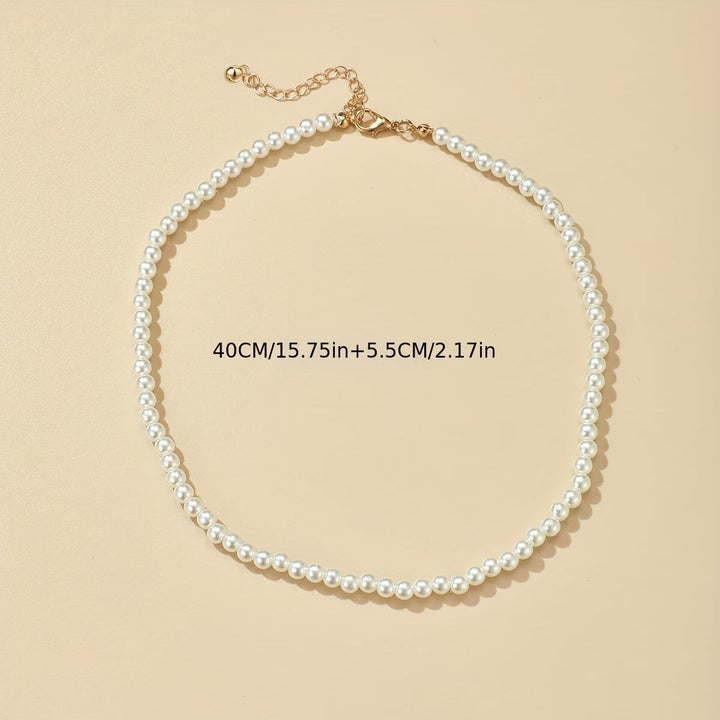 Classic pearl necklace styled around a mannequin neck form