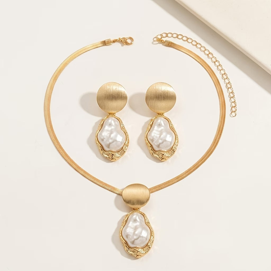 Jewelry set styled on a model wearing the necklace and earrings