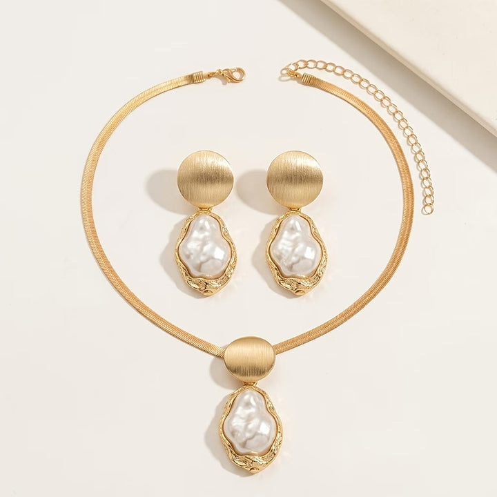 Jewelry set styled on a model wearing the necklace and earrings