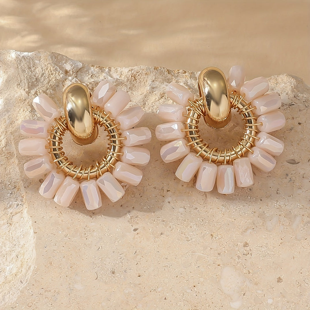 Model wearing the pearl beaded fan earrings