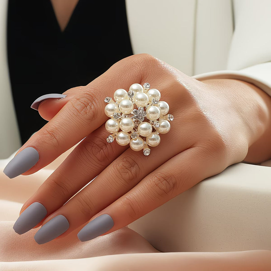 Pearl bloom adjustable ring with a flower-shaped pearl setting