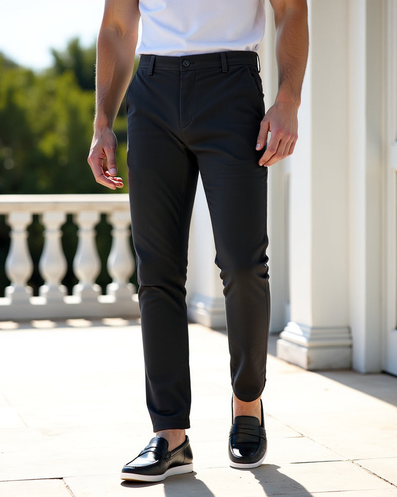 Everyday slim chinos in black, lifestyle shot styled
