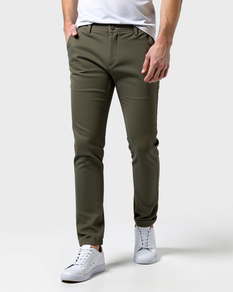 Everyday slim chinos in olive green, front view on model