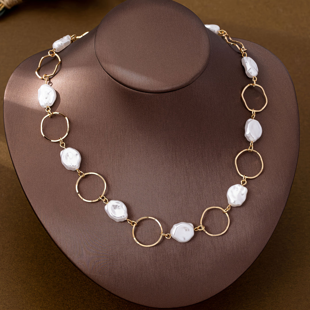 Necklace draped over a stand to show its full length