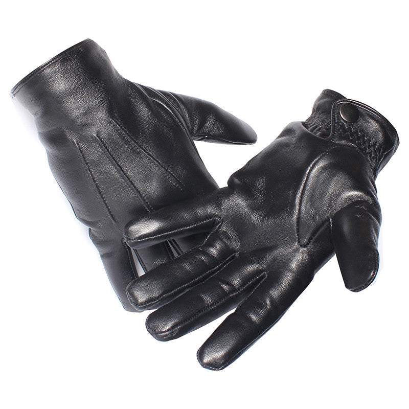 Vintage leather gloves in black, worn on hand