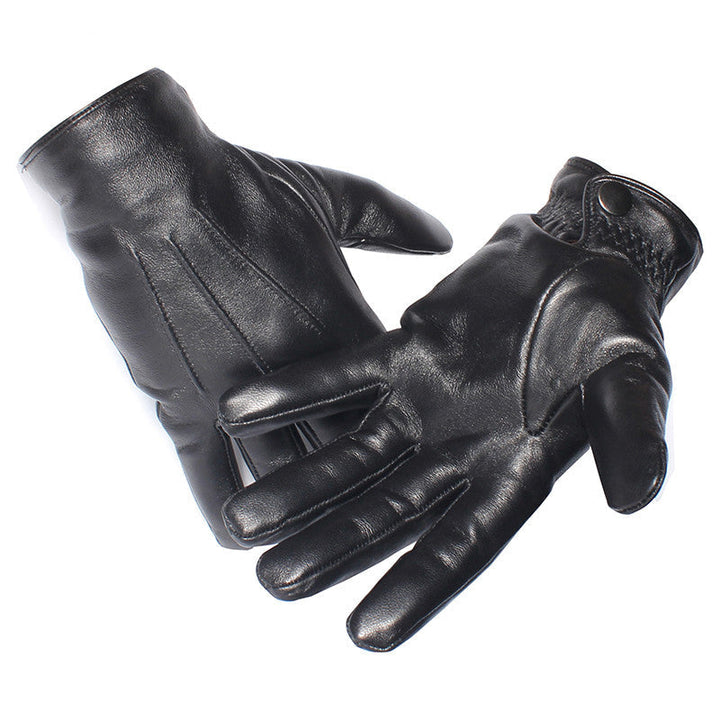 Vintage leather gloves in black, worn on hand