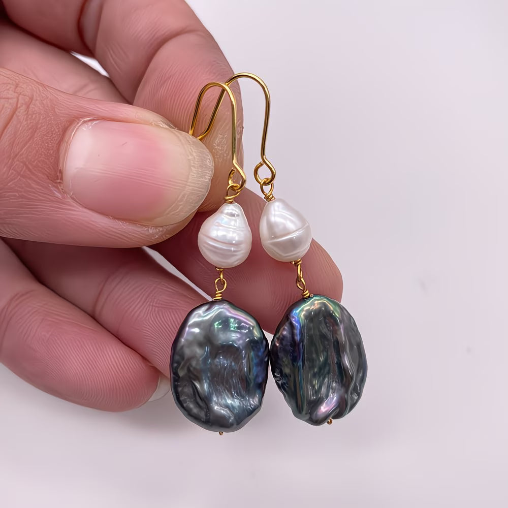 Close-up of the iridescent peacock-toned pearl surface