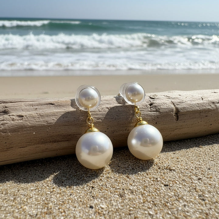Angled close-up showing the polished surface of the pearl