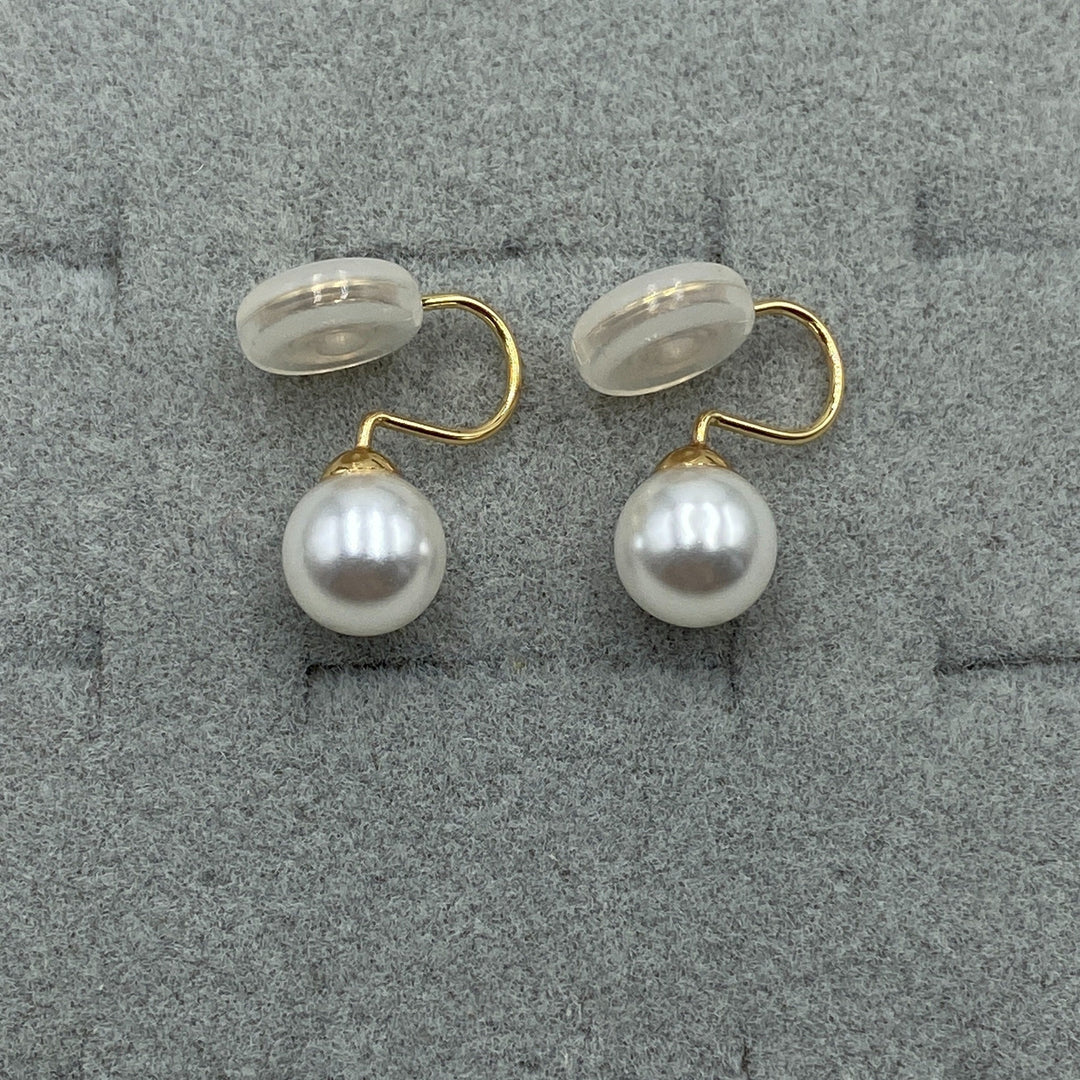 Side view of the clip closure and pearl setting
