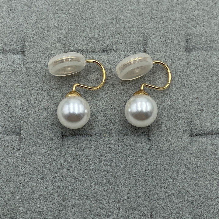Side view of the clip closure and pearl setting