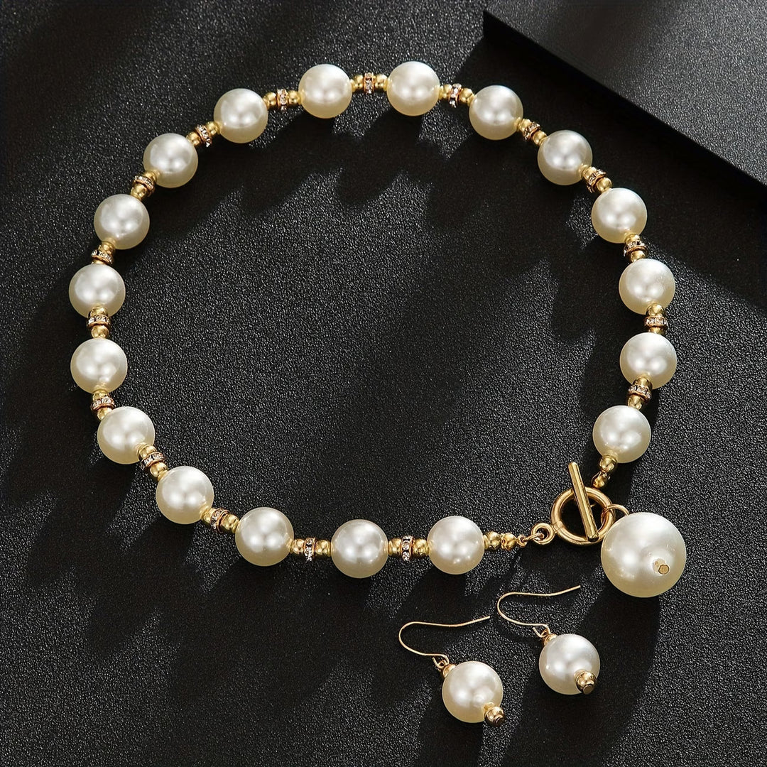 Model wearing the layered chunky pearl necklace set
