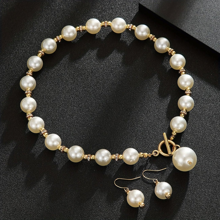 Model wearing the layered chunky pearl necklace set