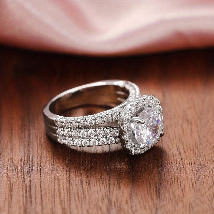 Ring worn on a model's hand
