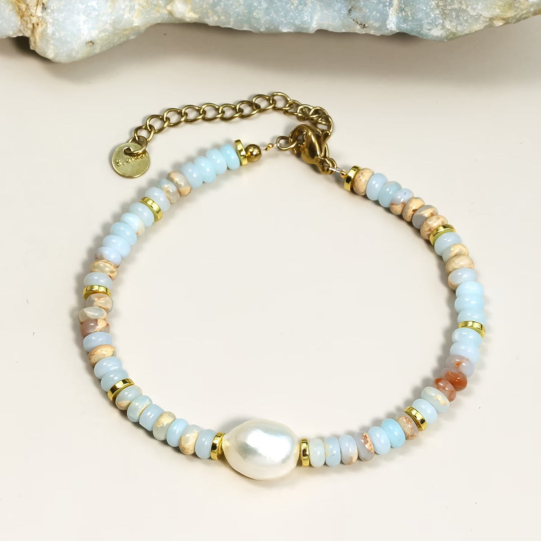 Main shot of the beach pearl and turquoise charm bracelet