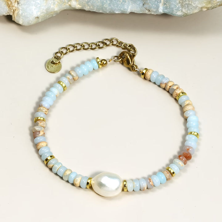 Main shot of the beach pearl and turquoise charm bracelet
