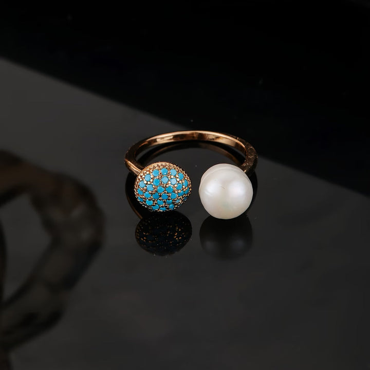 Pearl and turquoise adjustable ring shown from the front