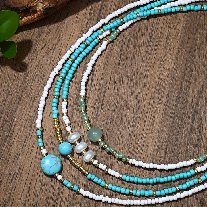 Bracelet set styled on a jewellery tray with soft lighting