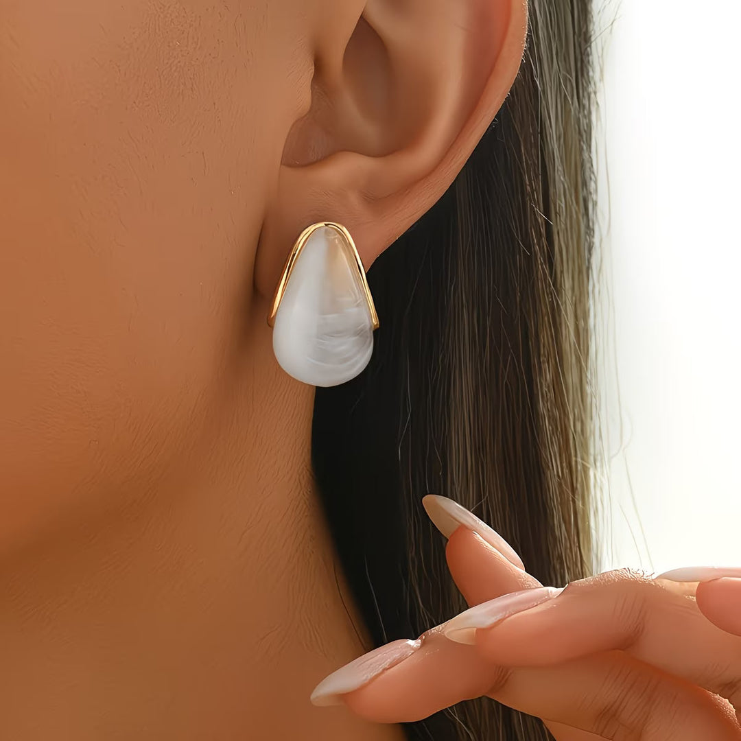 Model wearing the pearl water drop earrings